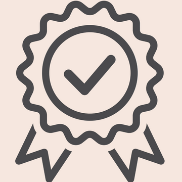 Black and white icon of a check mark inside a decorative border on a white background
